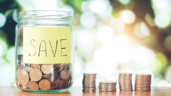 jar with Save filled with coins