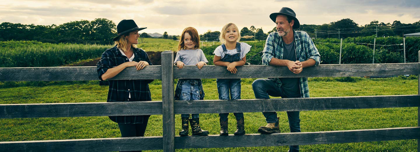 A young family on a farm.